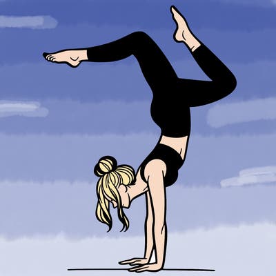 a woman doing a handstand