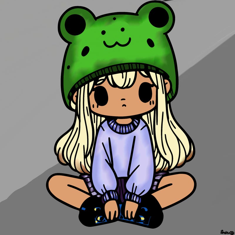 a girl wearing a frog hat and some frog socks