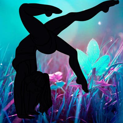 a woman doing a handstand