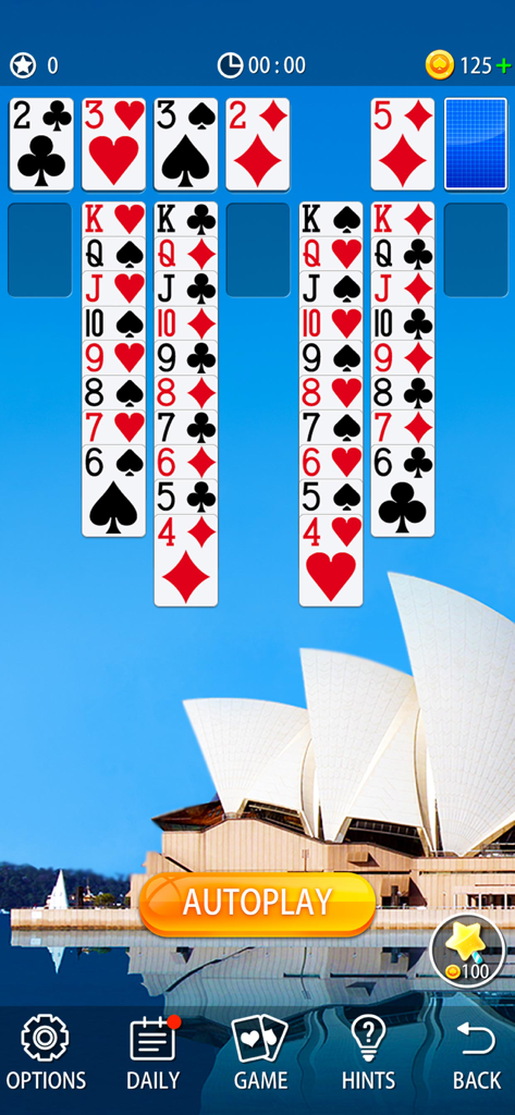 Classic solitaire card game interface with Sydney Opera House background theme