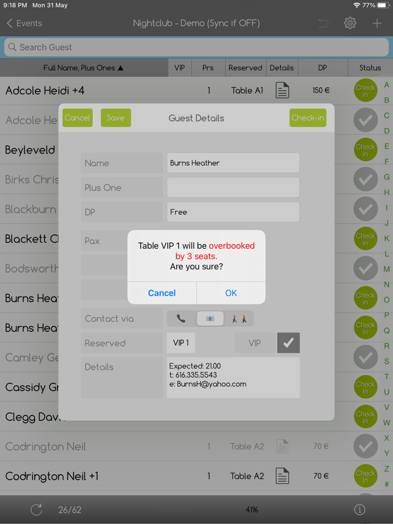 e-GuestList app on iPad displaying a table seating capacity alert