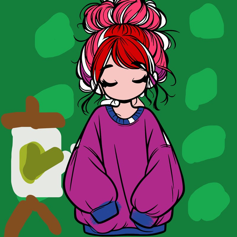 girl with baggy sweatshirt and messy bun