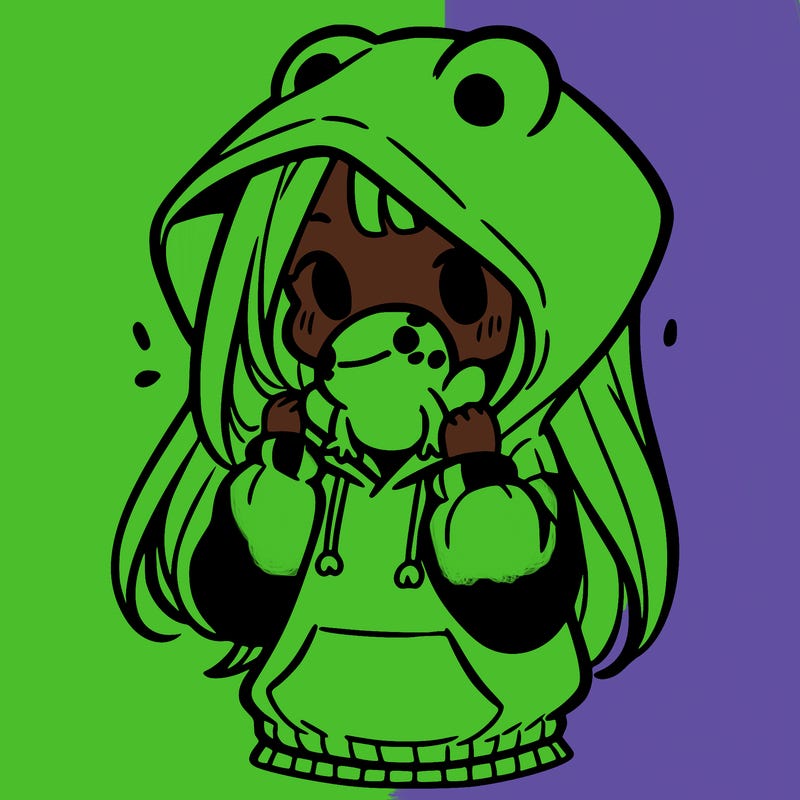 a girl holding a froggy hoodie