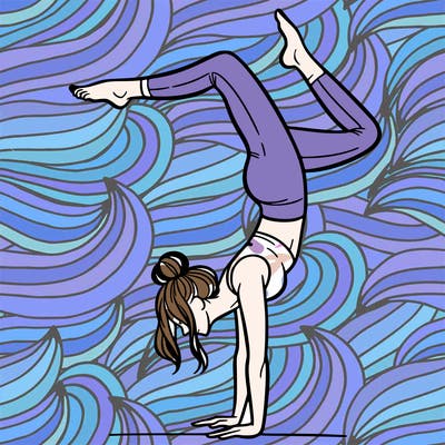 a woman doing a handstand