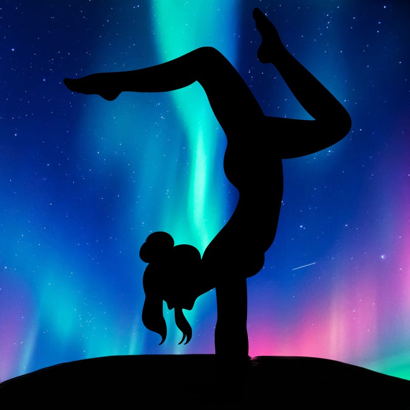 a woman doing a handstand