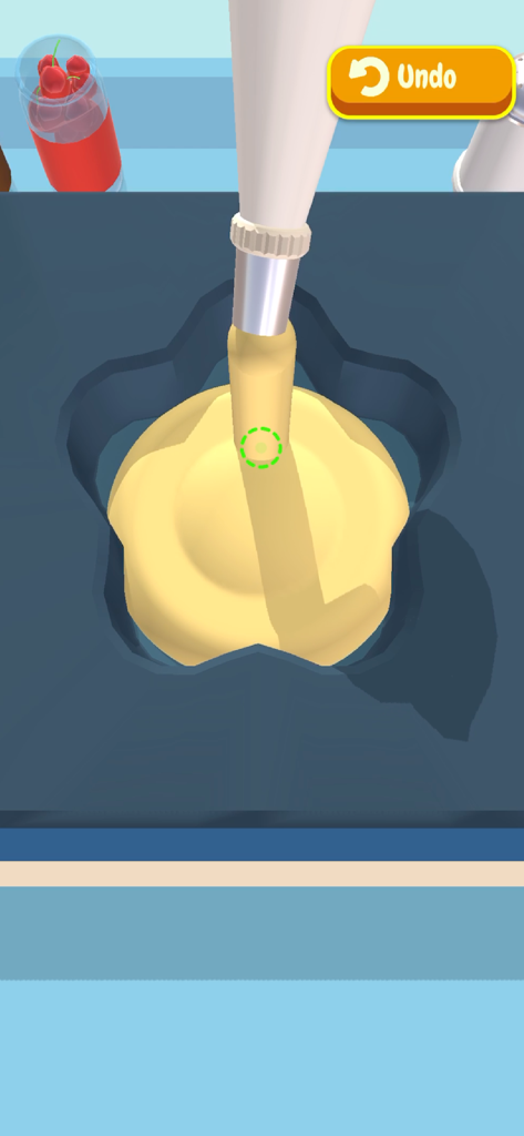 Bake it - Une poche à douille remplissant un moule en forme de fleur avec de la pâte à gâteau jaune dans le jeu Bake it