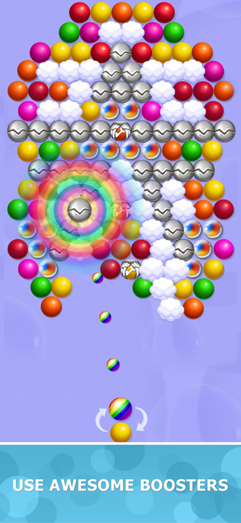 Bubblez Magic Bubble Quest gameplay screen showing a rainbow booster bubble being fired at colorful bubbles.