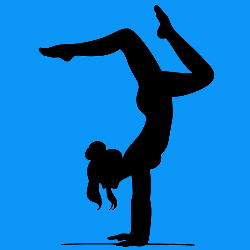 a woman doing a handstand