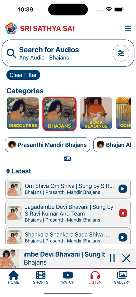 Prasanthi Connect - The audio player screen of the Prasanthi Connect app featuring categories for spiritual discourses and bhajan music
