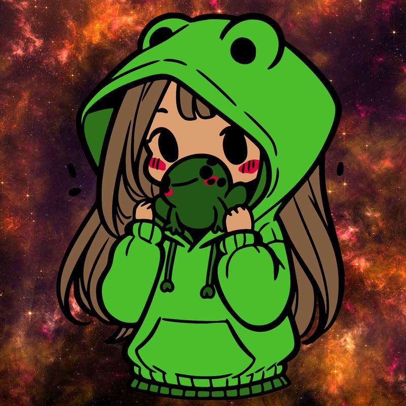 a girl holding a froggy hoodie