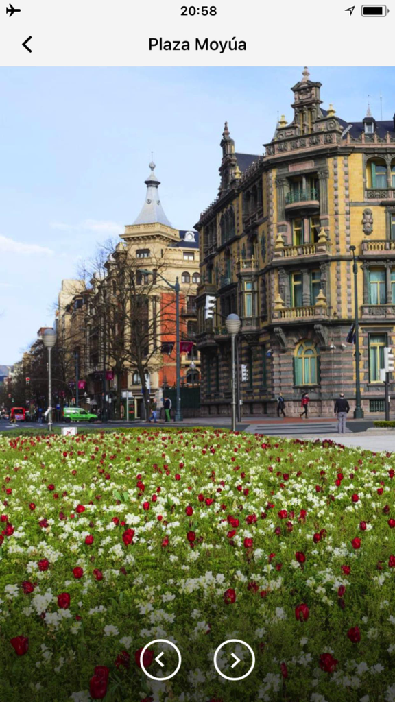 Bilbao Travel Guide Offline - Plaza Moyúa, plaza histórica en Bilbao con flores y arquitectura clásica