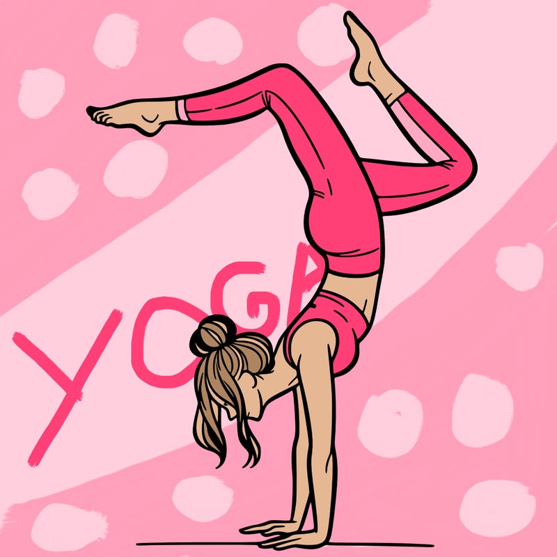 a woman doing a handstand