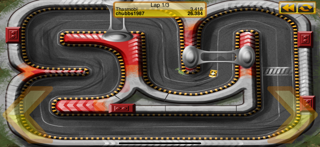 Tiny Racing - Top down view of a yellow car racing on a circuit track in Tiny Racing.