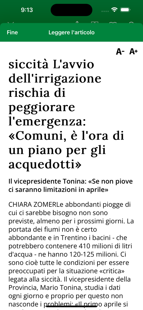 Tela de artigo de notícias no aplicativo móvel l'Adige quotidiano mostrando notícias locais do Trentino