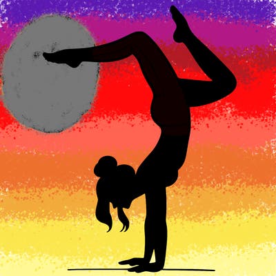 a woman doing a handstand