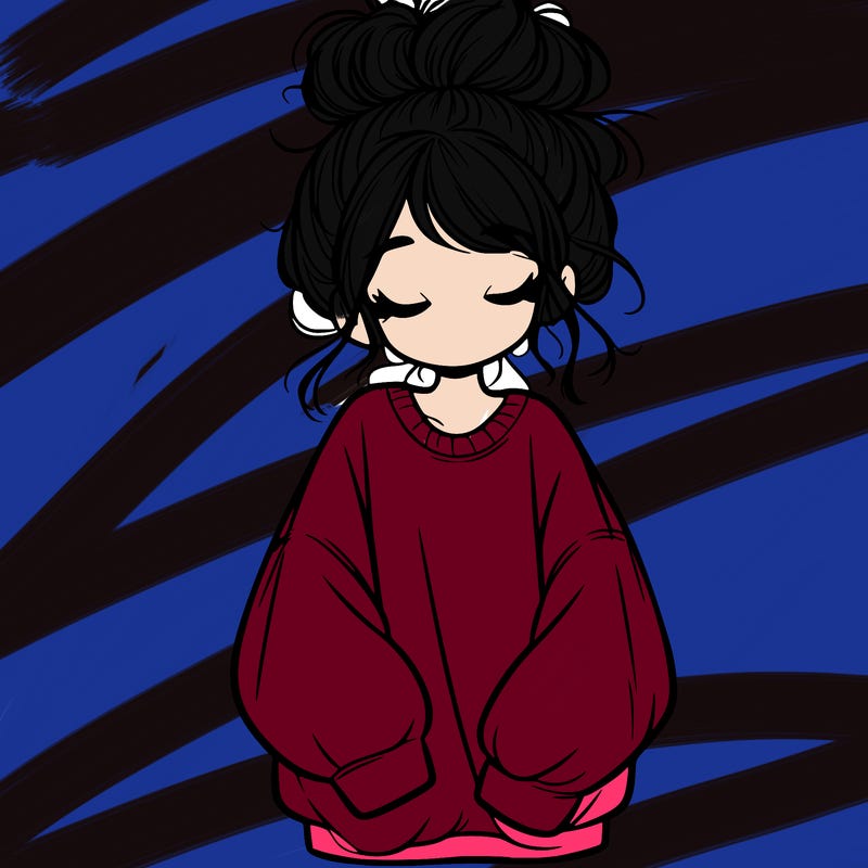 girl with baggy sweatshirt and messy bun
