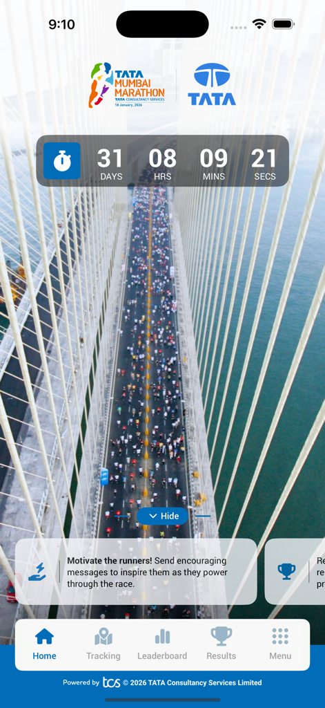 Home screen of the TMM 2026 app displaying a countdown timer to the marathon and runners on a bridge