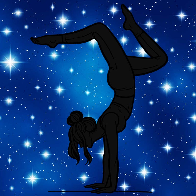 a woman doing a handstand