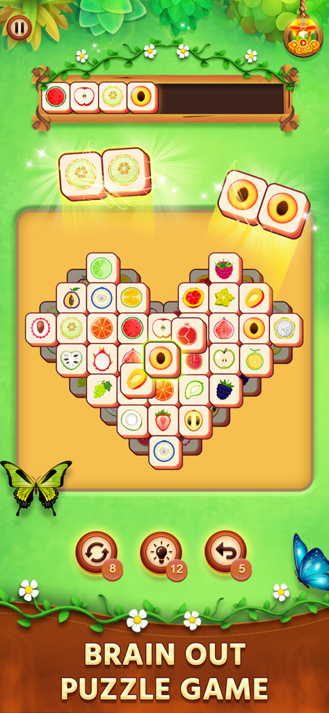Tile Match - Puzzle - Tile Match puzzle gameplay showing fruit tiles arranged in a heart shape for brain training