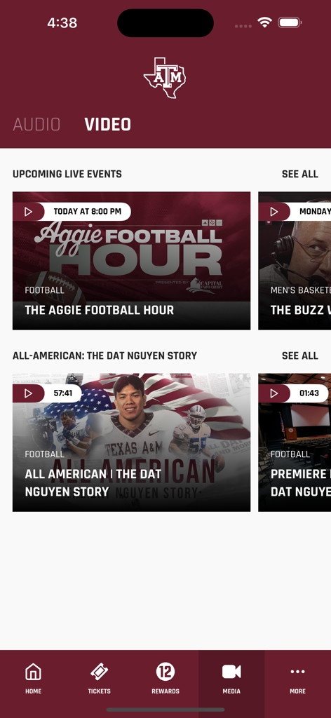 Video media screen of the 12th Man Mobile app featuring Texas AM sports content and live event schedules.