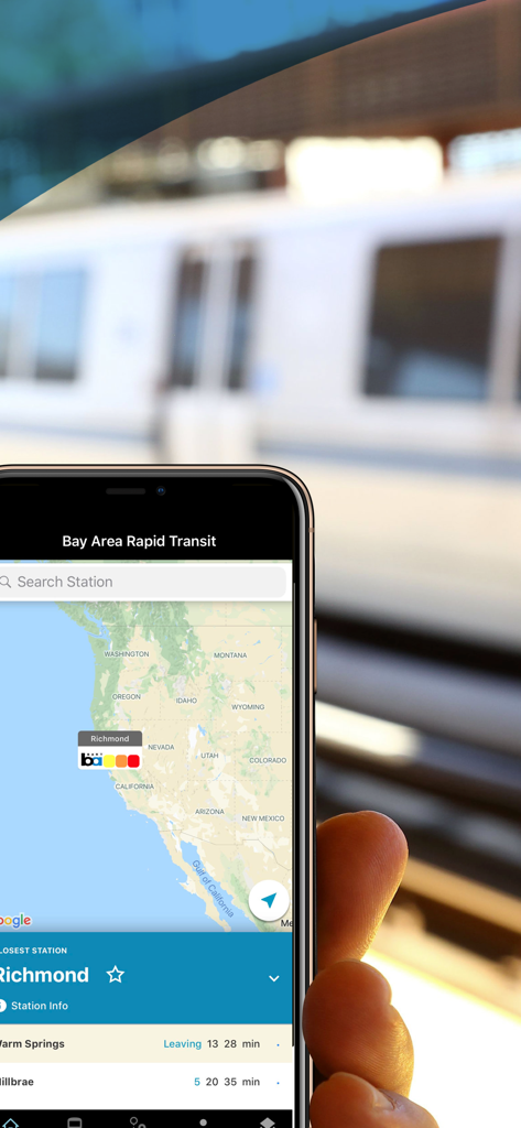 BART (Official) - Smartphone showing BART app map and real time train departures at a station