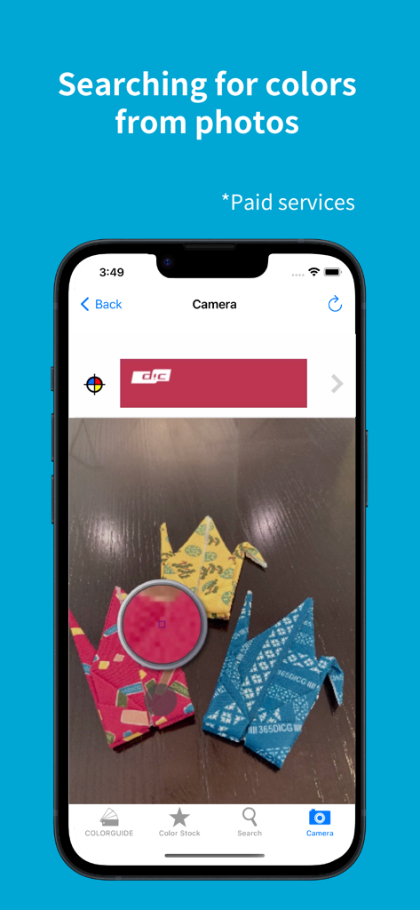 Interface of the DIC COLOR GUIDE app showing the search for colors from a photo feature using a smartphone camera