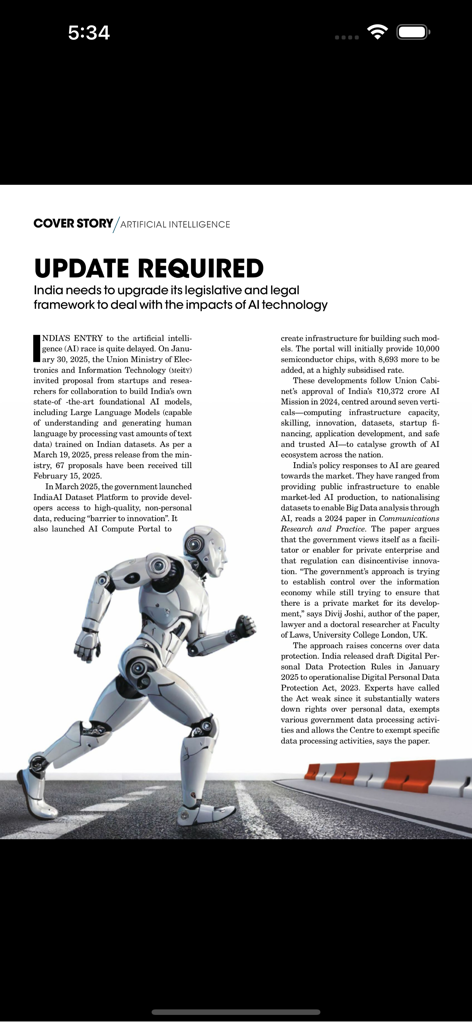 Una pagina di articolo di Down To Earth Magazine sull'intelligenza artificiale e il quadro giuridico dell'India con l'illustrazione di un robot in corsa