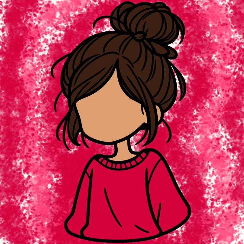 girl with messy bun with is a sweatshirt