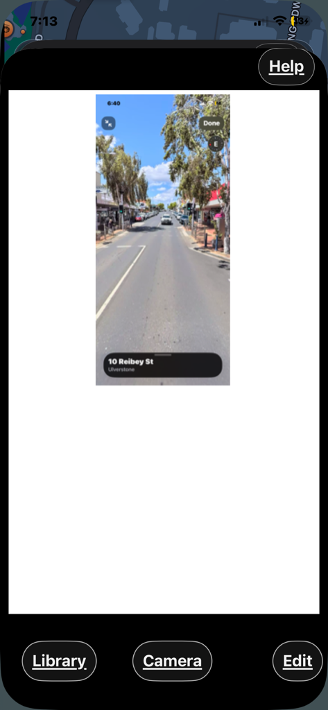 A mobile interface for the Track My Trip app showing a street view photo tagged with a specific address and location