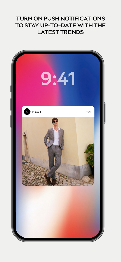 Next: Shop Fashion & Homeware - Next app push notification on a smartphone showing fashion trends