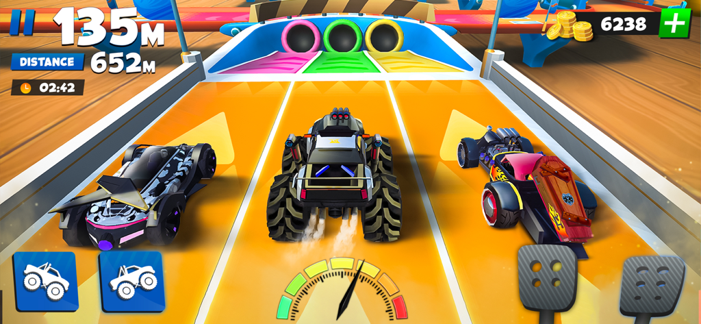 Buggy Racing Games (RaceOff2) - Three customized monster trucks lined up on an orange tabletop racing track in Buggy Racing Games
