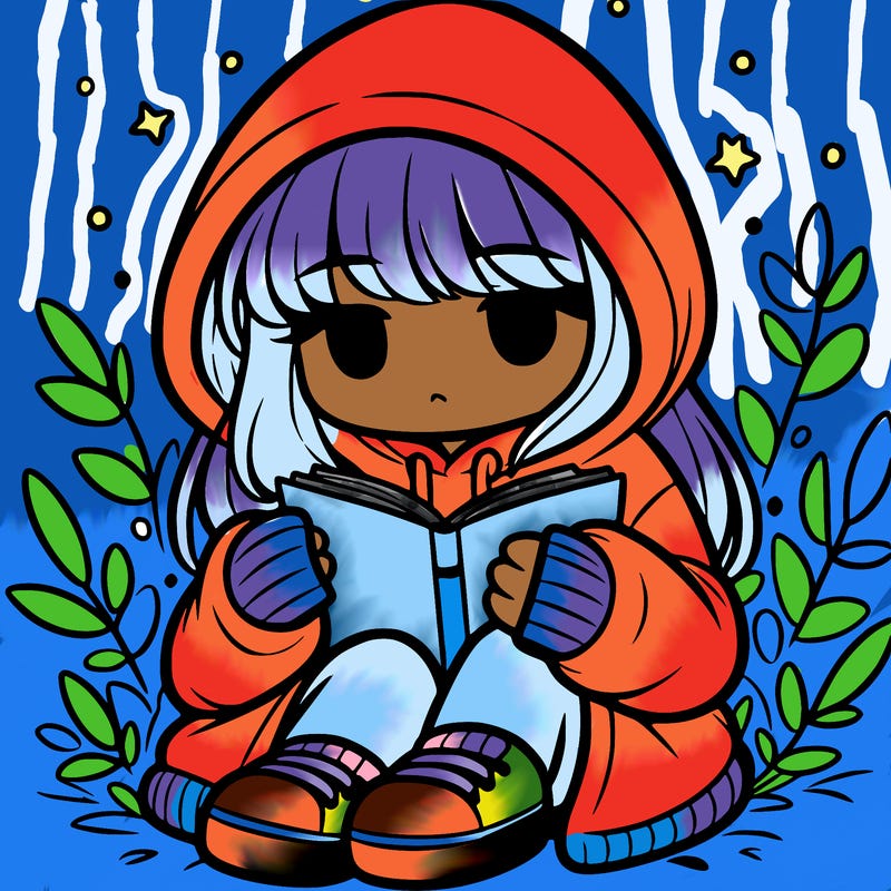 girl in oversized hoodie reading a book