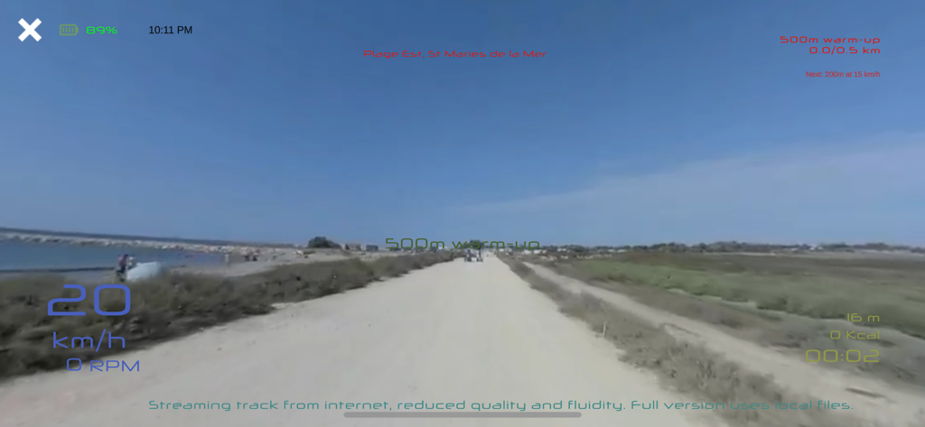 kinomap vr - First-Person-Ansicht einer virtuellen Cycling-Strecke entlang einer Strandstraße in der Kinomap VR App