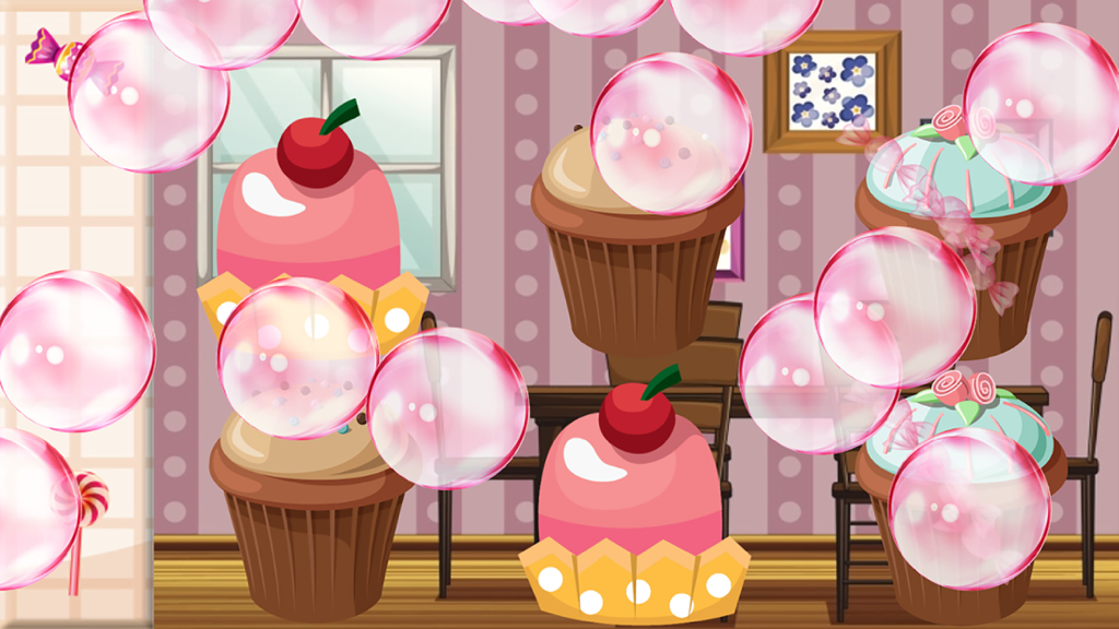 Cupcake colorati e bolle rosa fluttuanti nel gioco Candy and Cake Match per bambini