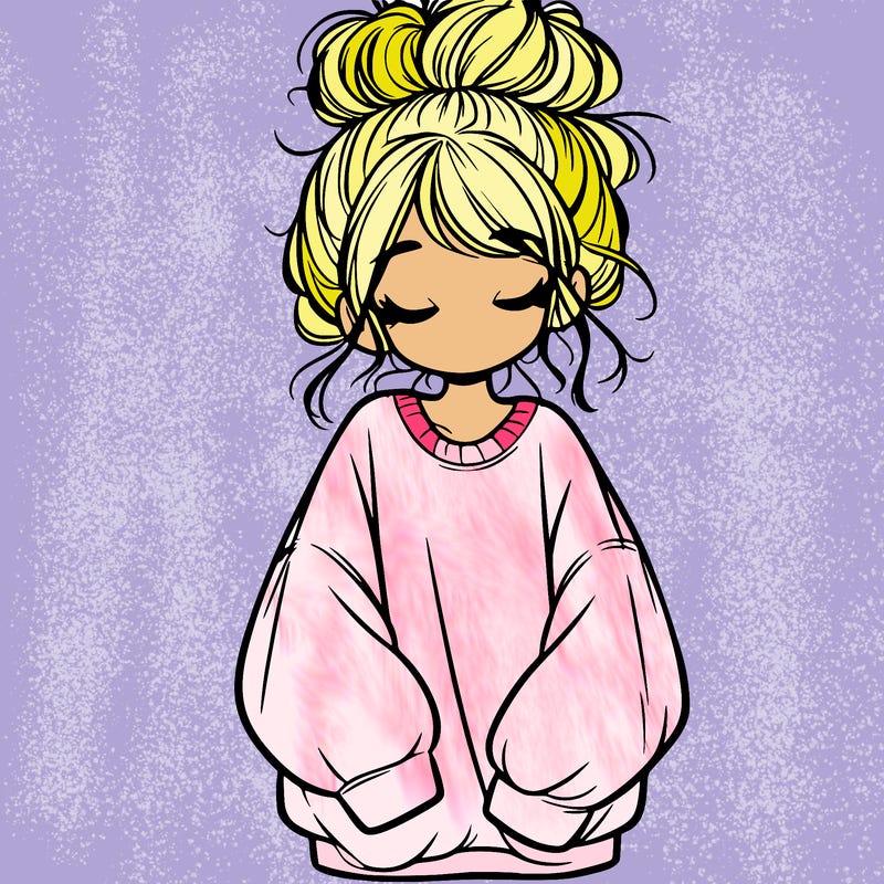 girl with baggy sweatshirt and messy bun