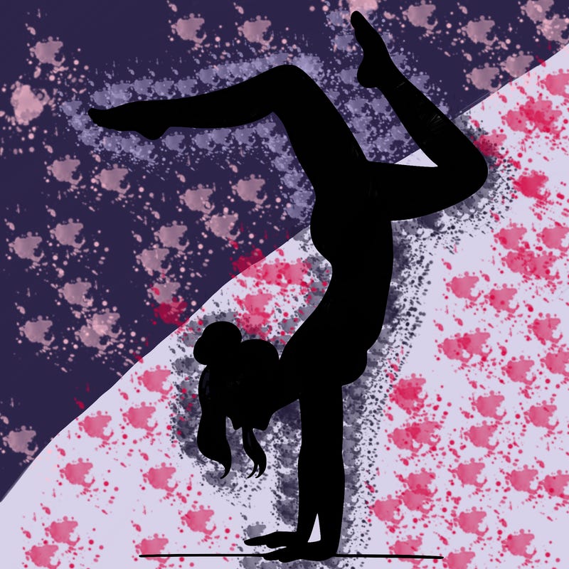 a woman doing a handstand