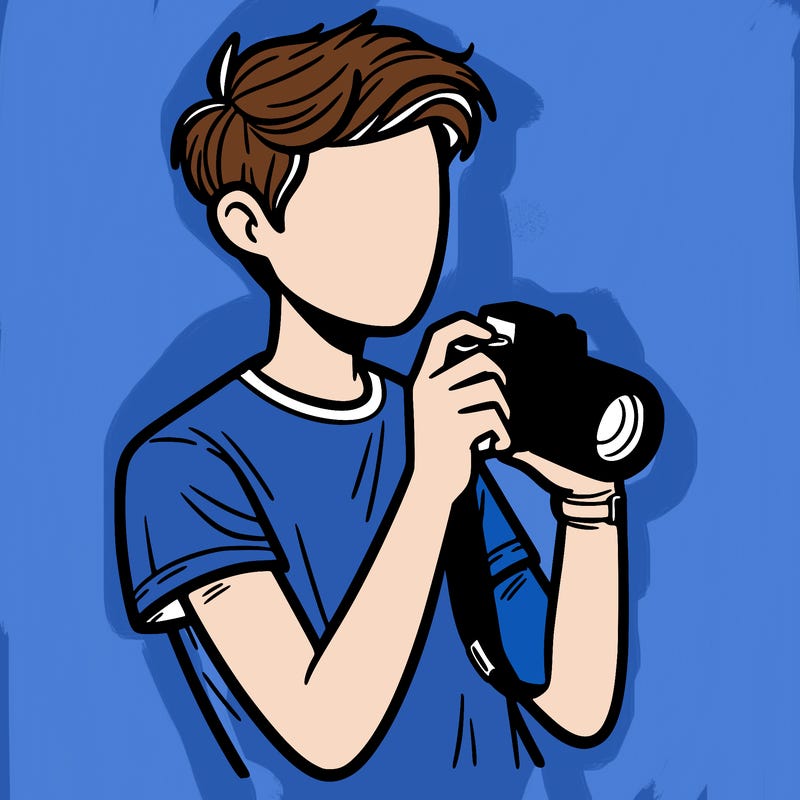 a guy holding a camera