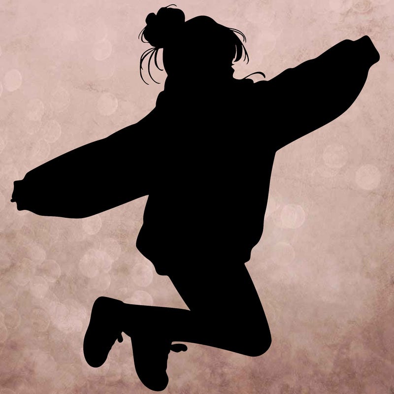 realistic girl jumping with a bun and oversized sweatshirt