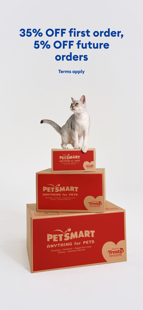 PetSmart - A cat sitting on a stack of PetSmart boxes with a promotional offer for 35 percent off first orders