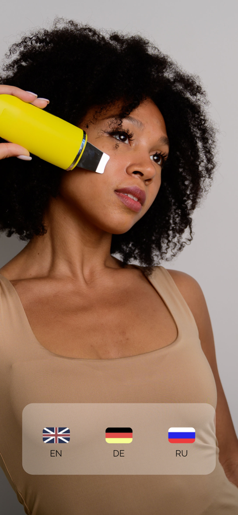 GESS - A woman using a yellow GESS ultrasonic skin scrubber on her face with language selection options at the bottom