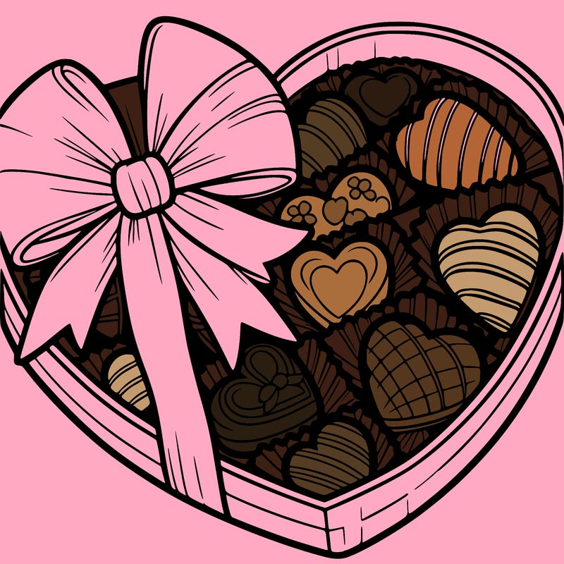 a heart-shaped box of chocolates with a bow.