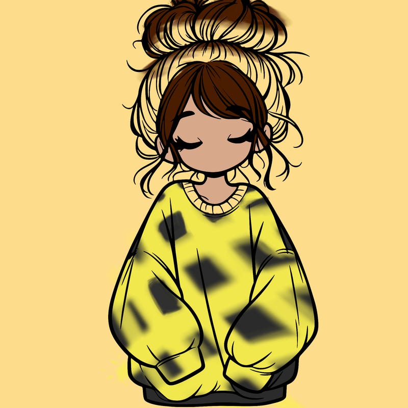 girl with baggy sweatshirt and messy bun