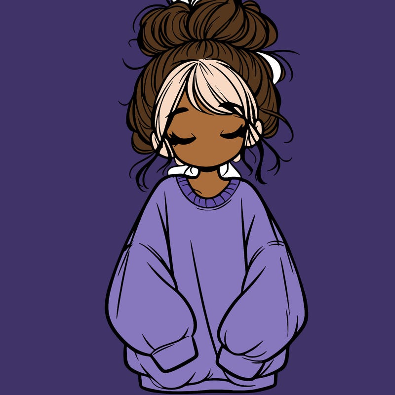 girl with baggy sweatshirt and messy bun