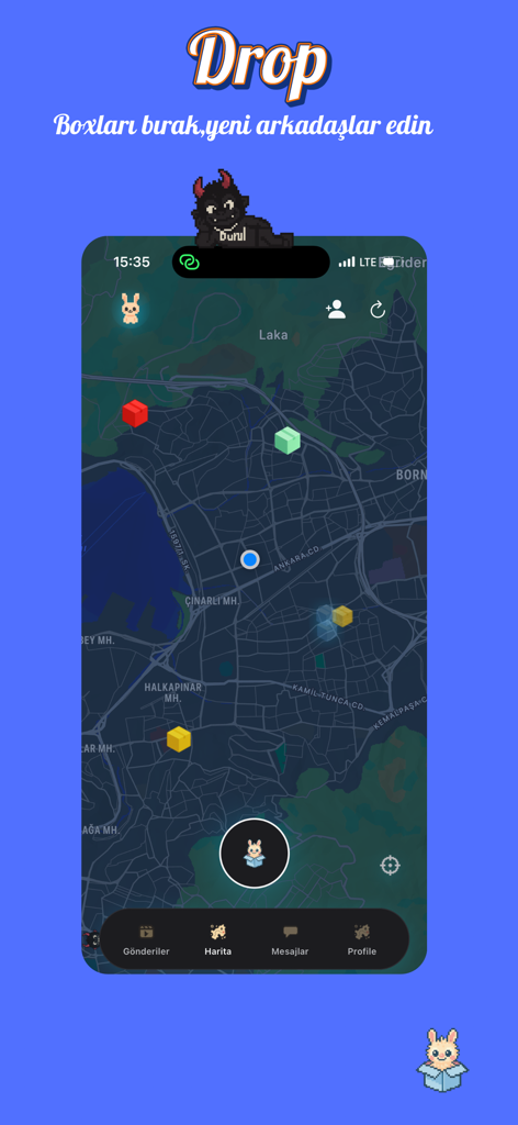 SpotBox mobile app screen displaying a dark mode social map with colored boxes dropped at various urban locations