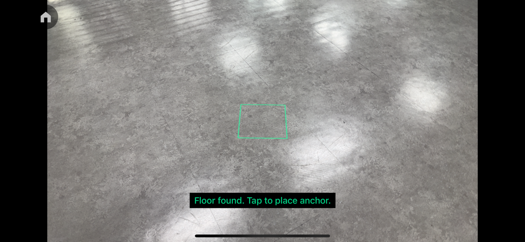 Beeble Camera - Beeble Camera app interface showing AR floor detection and a green square anchor point with the instruction Floor found Tap to place anchor