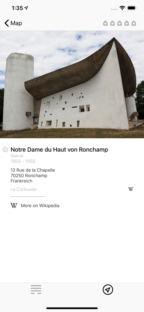 Detailed view of the Notre Dame du Haut chapel in the Architectures travel app featuring building information and architect details