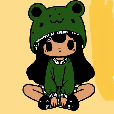 a girl wearing a frog hat and some frog socks