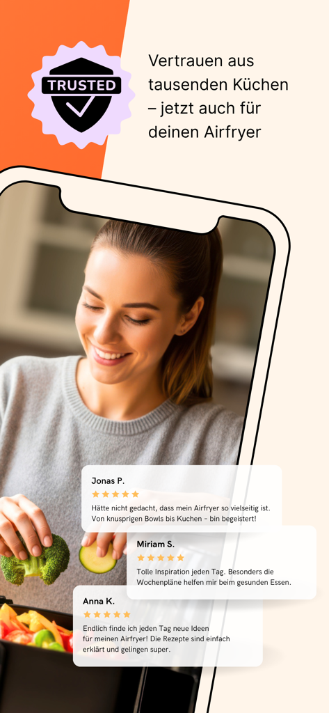 エアフライヤークラブ調理アプリの肯定的な顧客レビューと信頼バッジを示すスマートフォンの画面