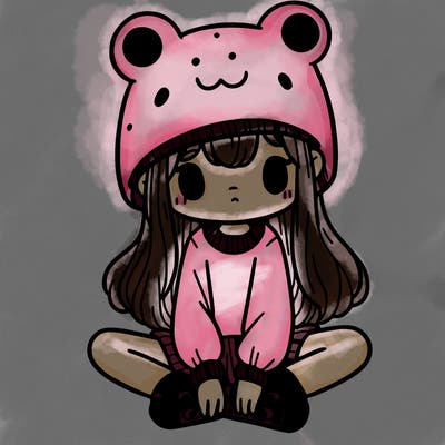 a girl wearing a frog hat and some frog socks