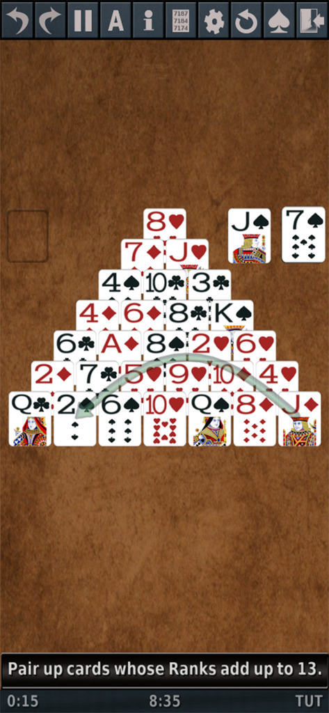 Solitaire 3D. - A game of Pyramid Solitaire in Solitaire 3D showing a card pyramid and instructions to pair cards that add up to 13.